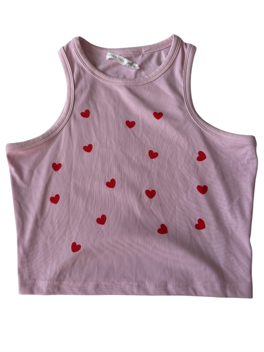 Altar'd State Pink Ribbed Crop Tank Top with an allover red heart pattern.
